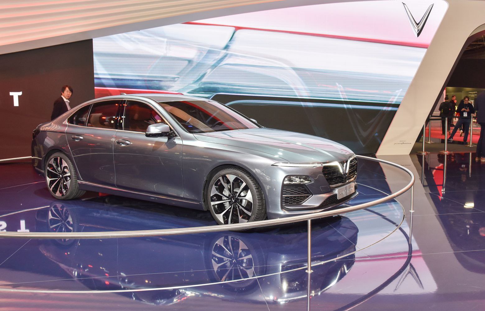 Sleek sedan front profile with alloy wheels