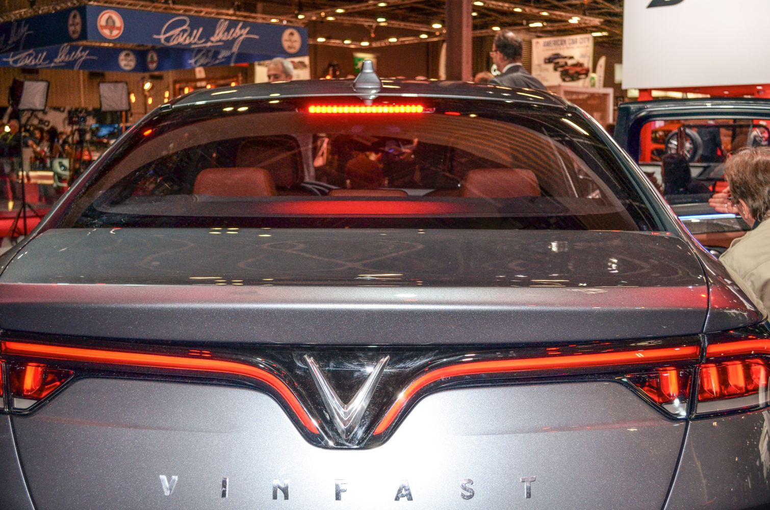 Rear LED tail light design and VinFast logo on sedan trunk.