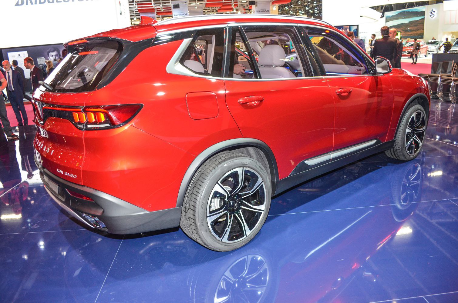Rear side view of a modern SUV with distinct taillights and alloy wheels