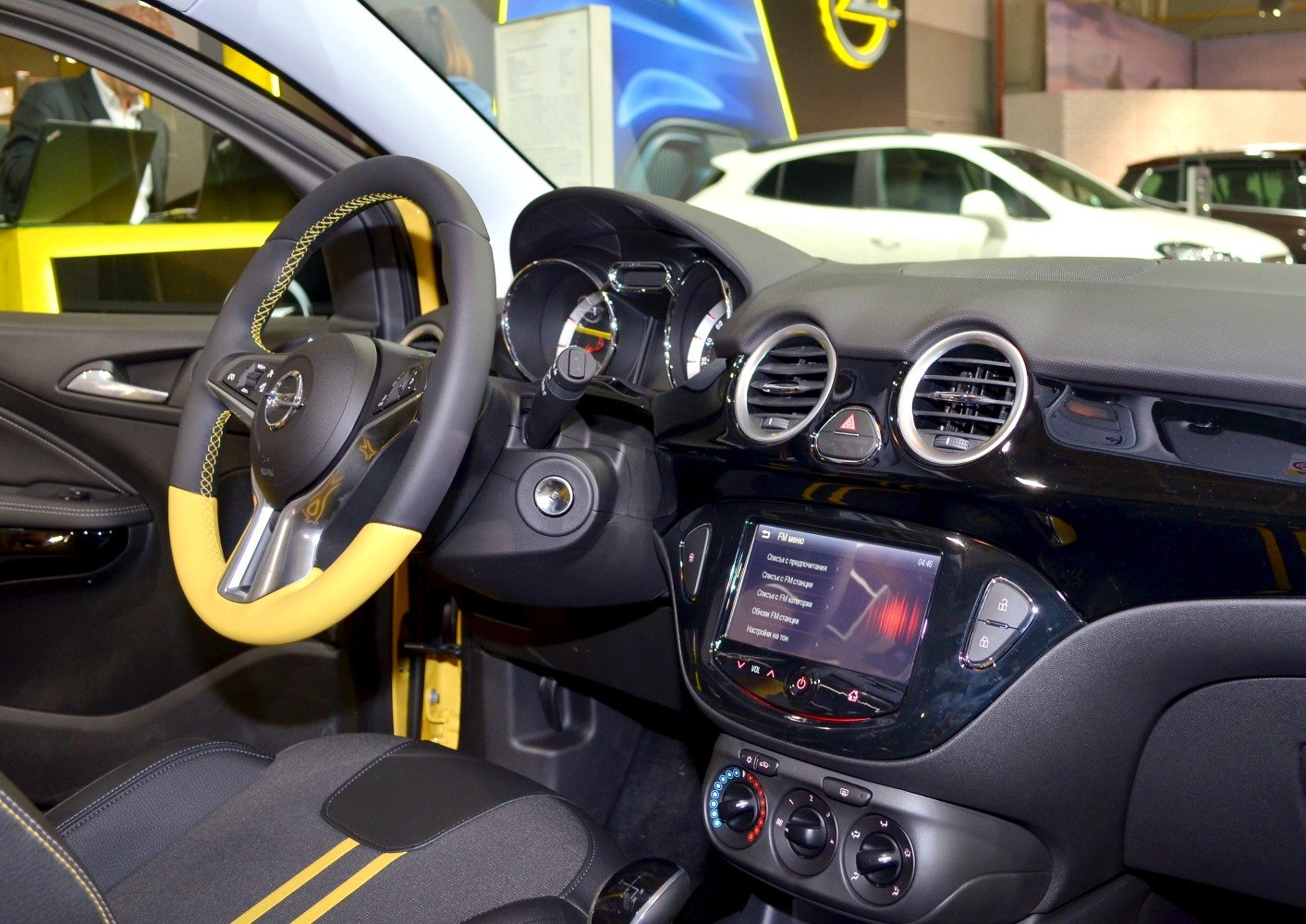 Interior dashboard with two-tone steering wheel and touchscreen infotainment