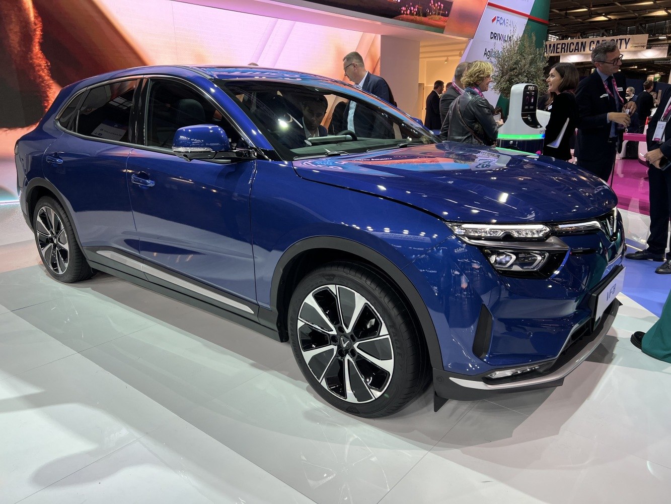 Electric SUV front-side view with modern headlights and alloy wheels