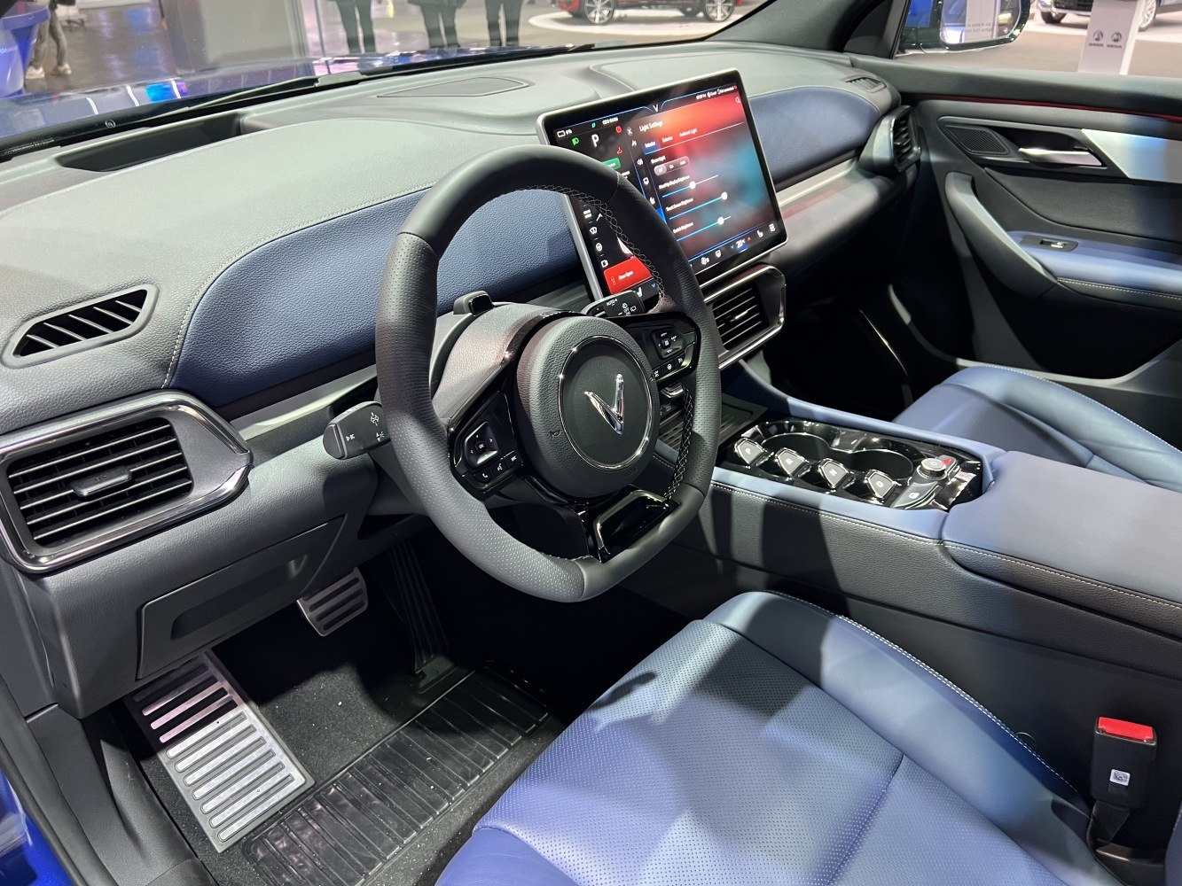 Digital touchscreen and ergonomic steering wheel with modern center console