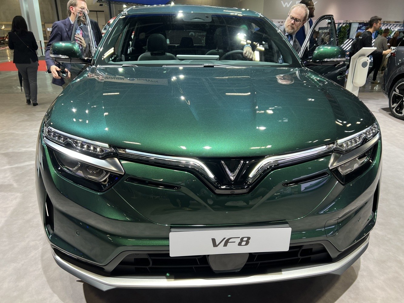 Front view with sleek LED headlights and bold grille design