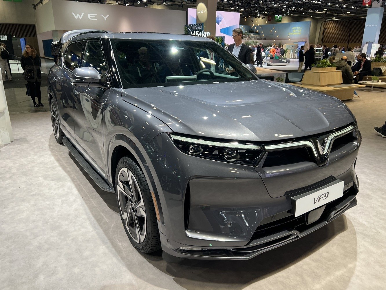 Front view of electric SUV with LED headlights and aerodynamic styling.