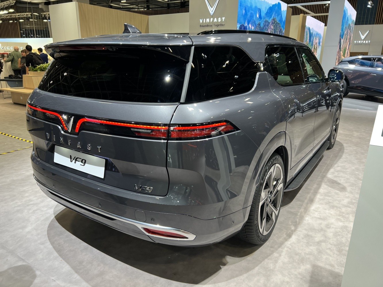 Luxury SUV rear with full-width LED tail light bar and sleek styling