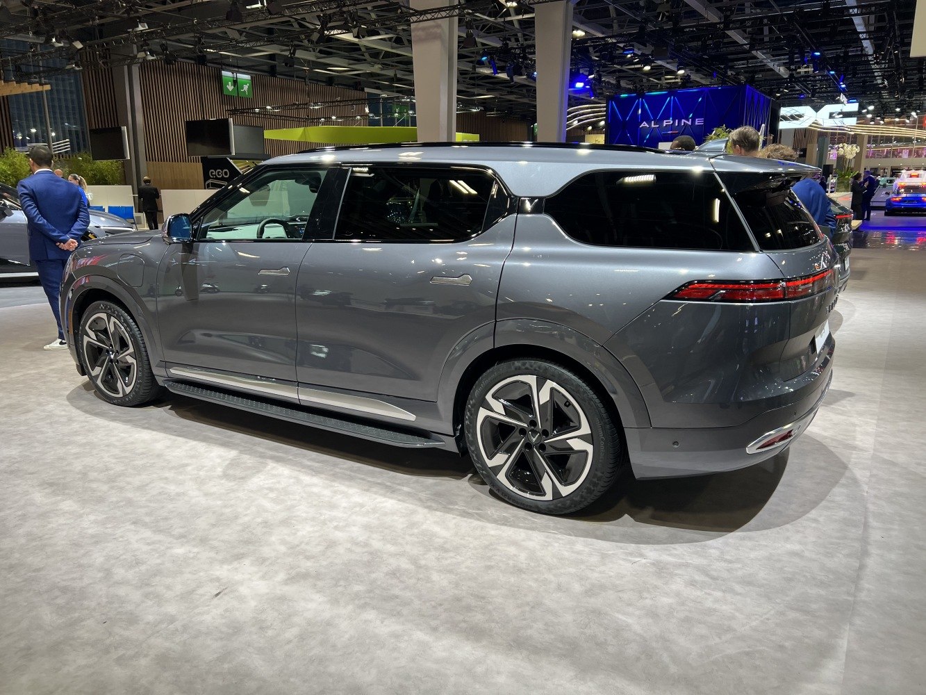 Side and rear view of a modern SUV with aerodynamic design and distinctive wheels
