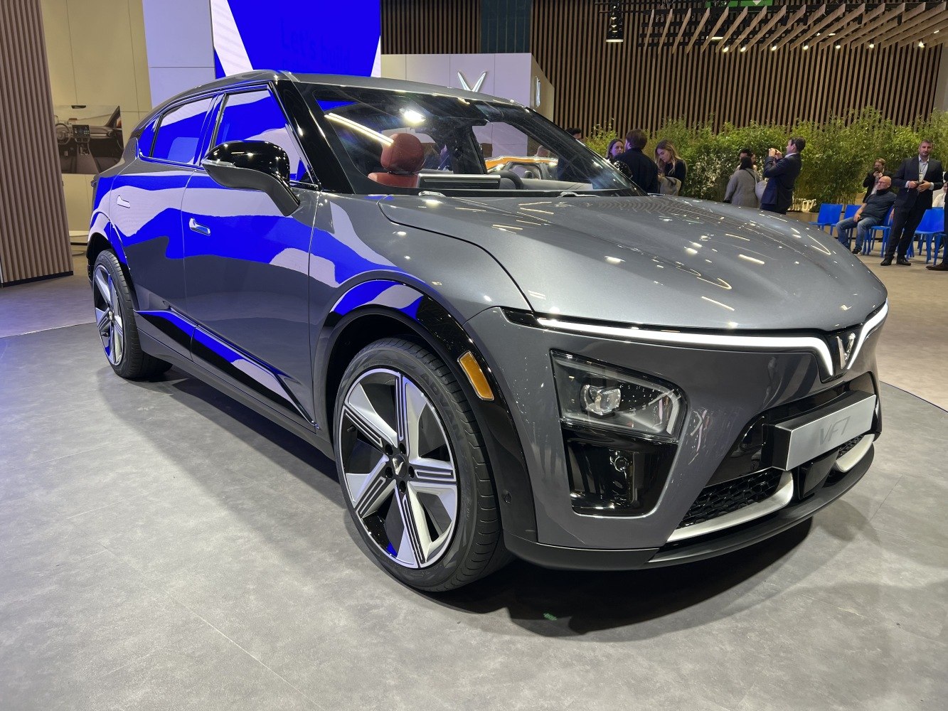 Front and side view of a modern electric SUV with sharp LED lighting and aerodynamic styling.