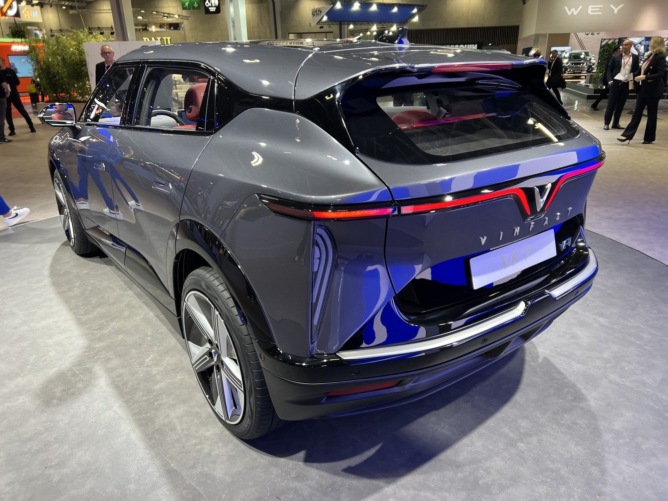 Modern electric SUV rear with sleek LED tail light and aerodynamic profile