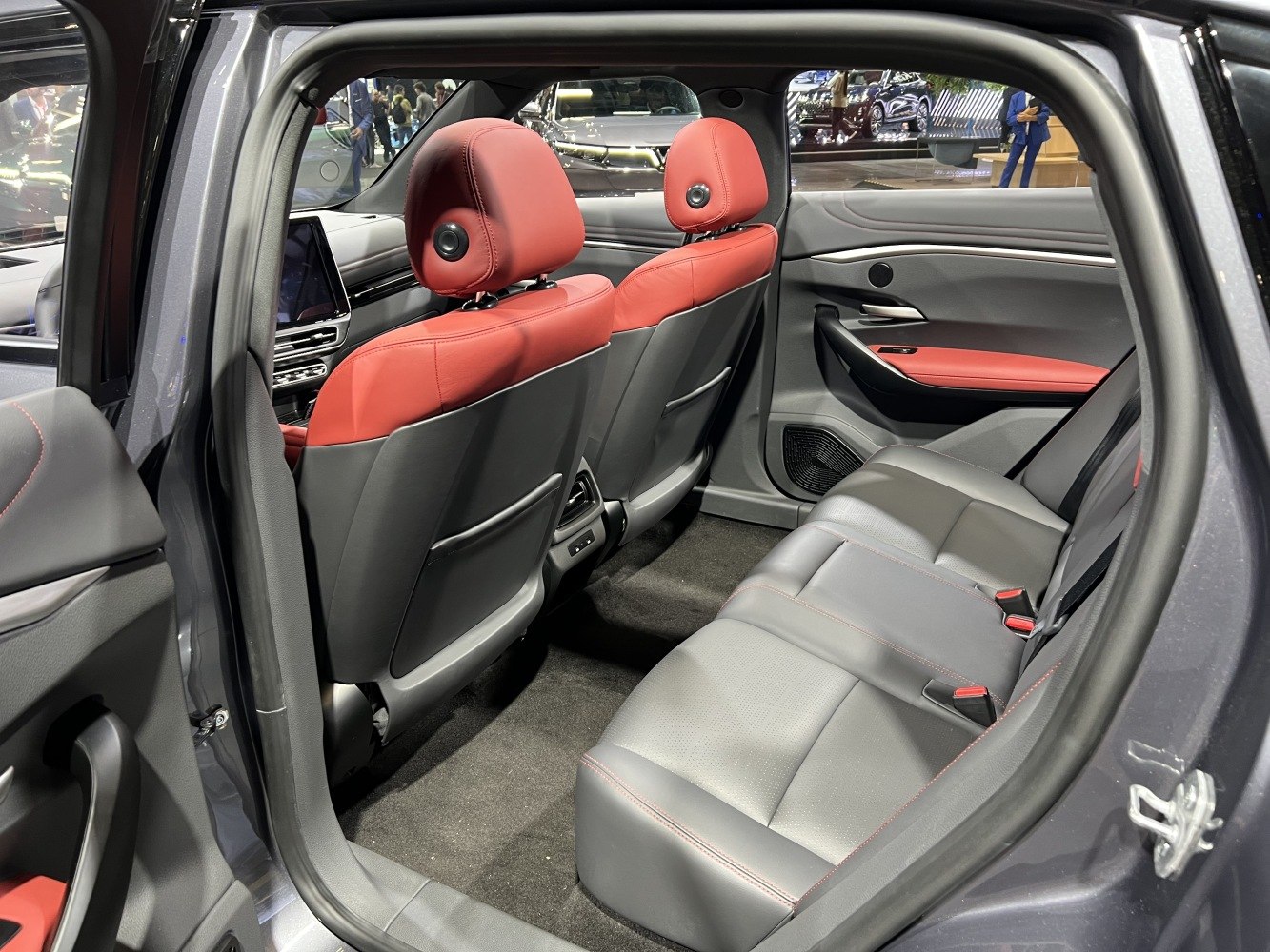Spacious rear seating with red and gray premium upholstery