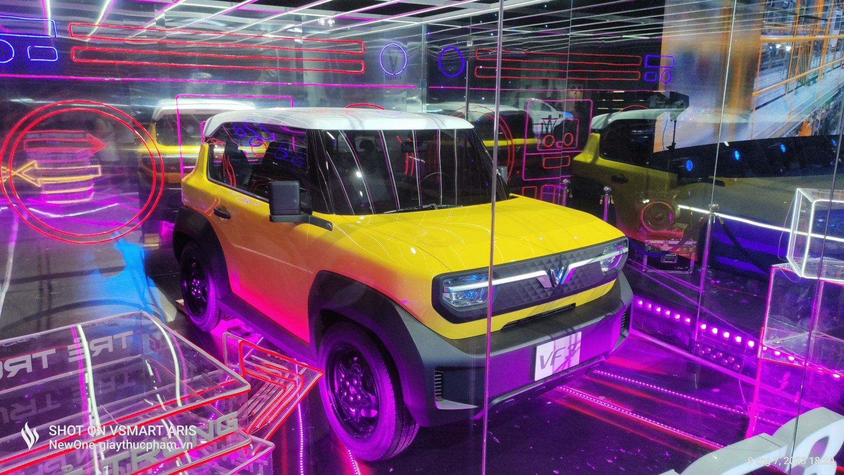 Compact electric SUV with bold yellow body and white roof