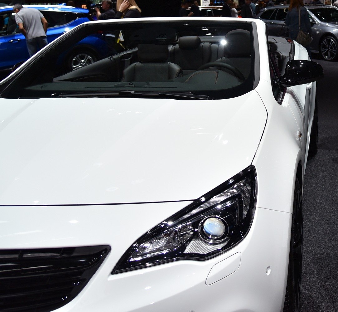 Convertible front with sleek headlights and windshield