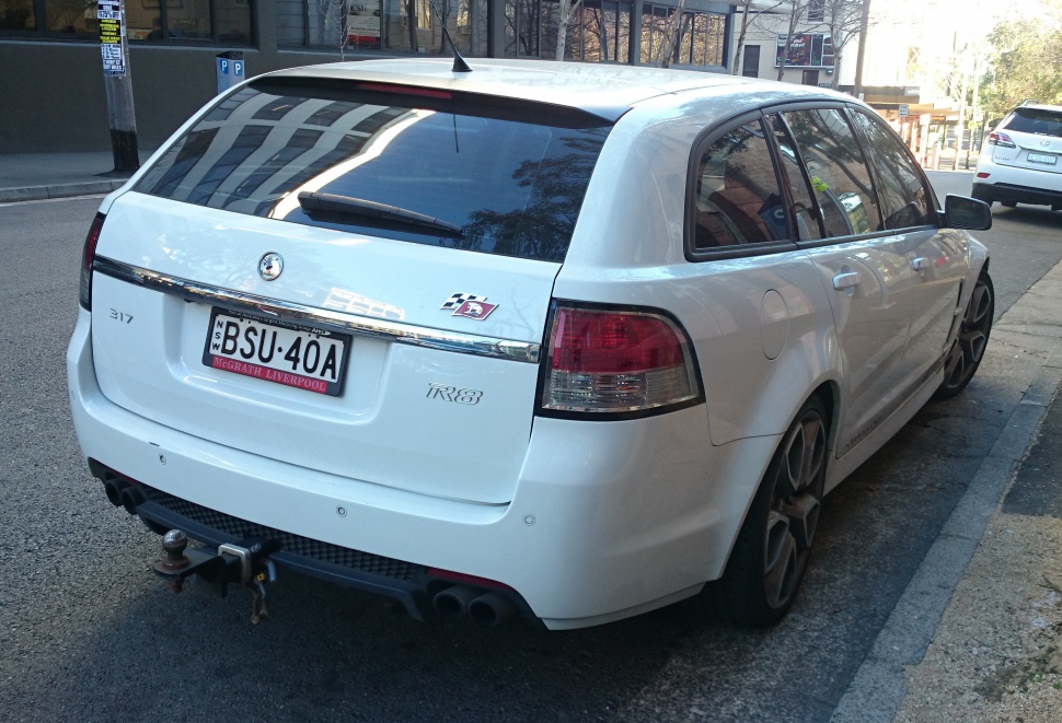 Rear view of sporty wagon with quad exhausts and tinted windows