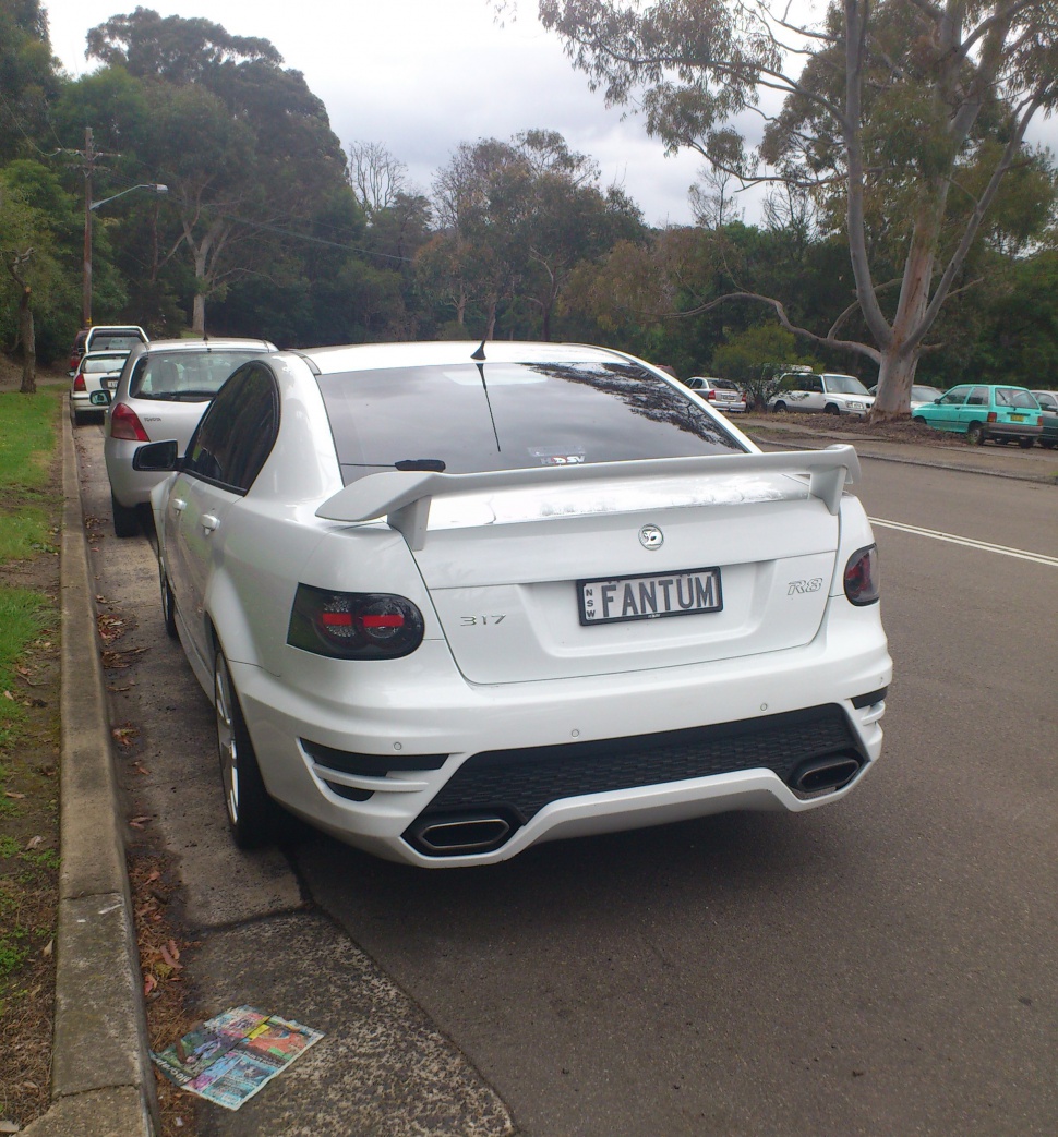 Rear view with spoiler and quad exhaust tips