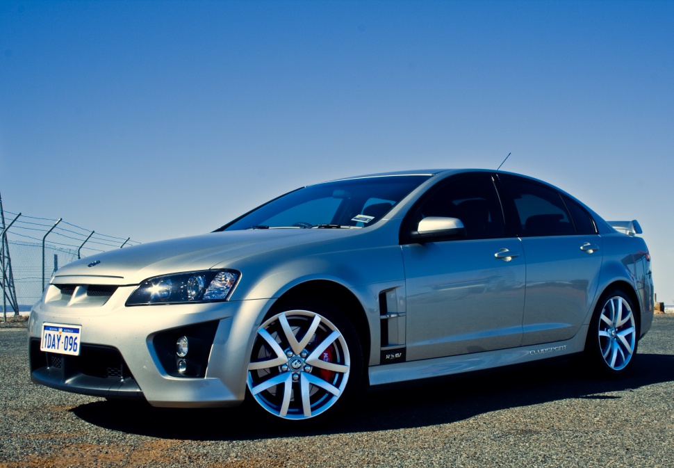 Aggressive front fascia and sporty alloy wheels on a performance sedan