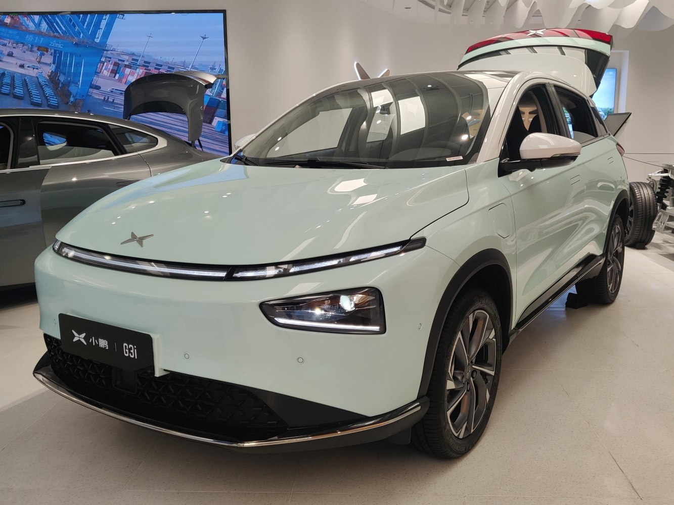 Electric SUV with sleek LED headlights and aerodynamic front design