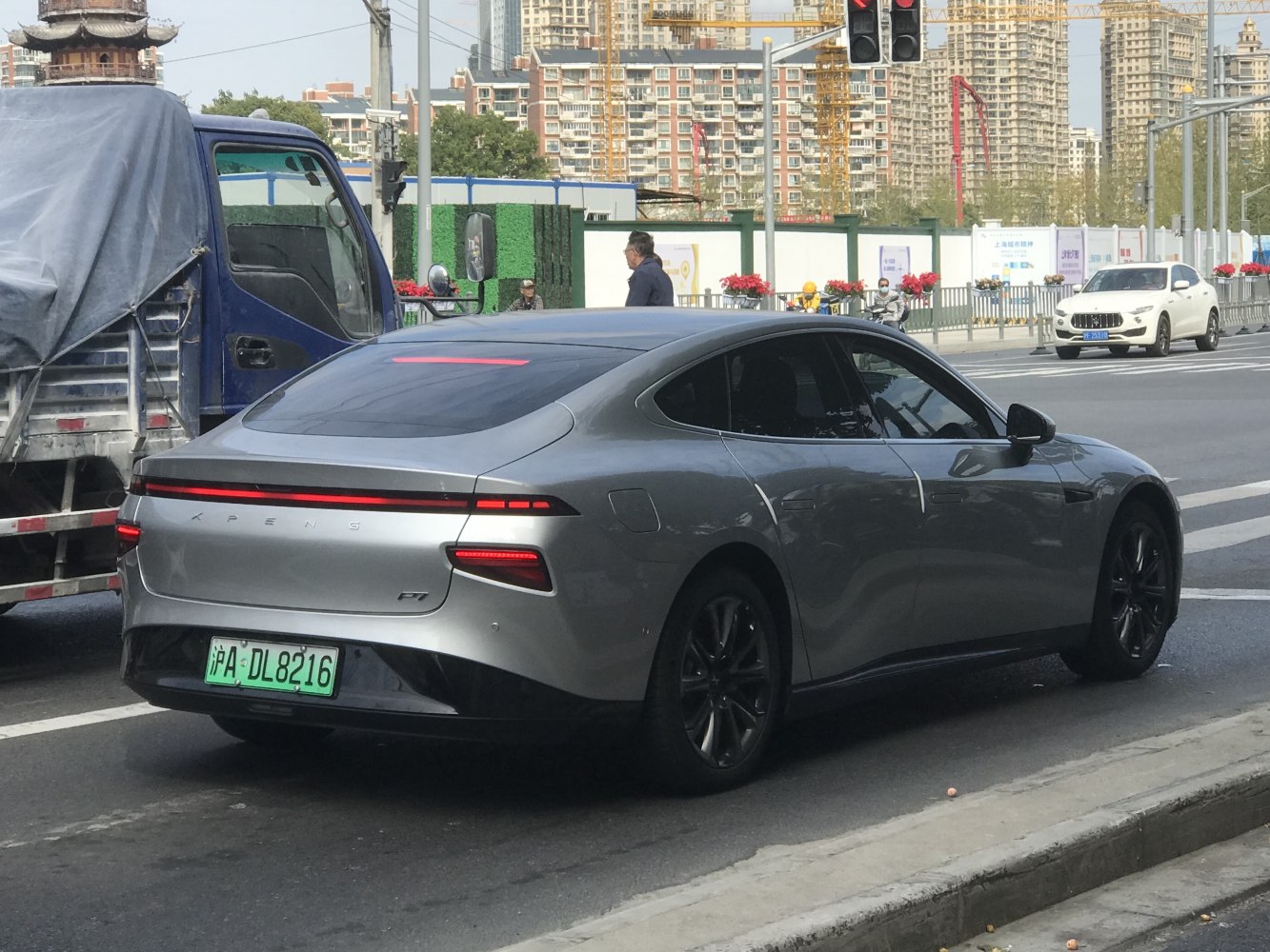 Sleek rear design with continuous LED tail light strip and aerodynamic shape