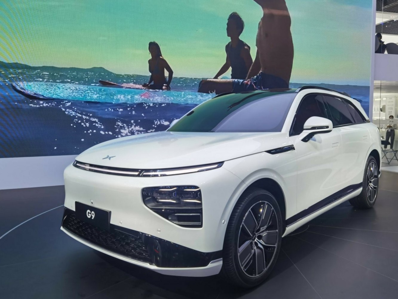 Front-angle view of sleek electric SUV with modern lighting and aerodynamic lines