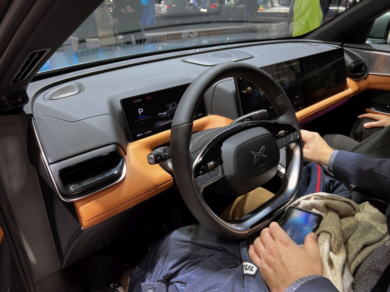 Digital instrument cluster and wide infotainment touchscreen with multifunction steering wheel