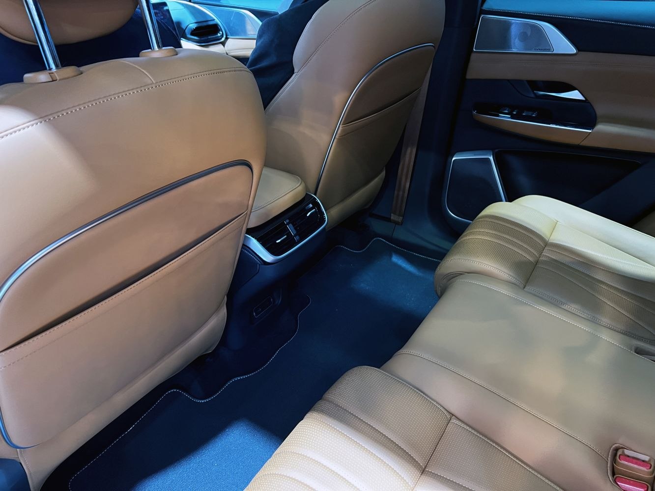 Brown leather rear seats with rear air vents and spacious legroom