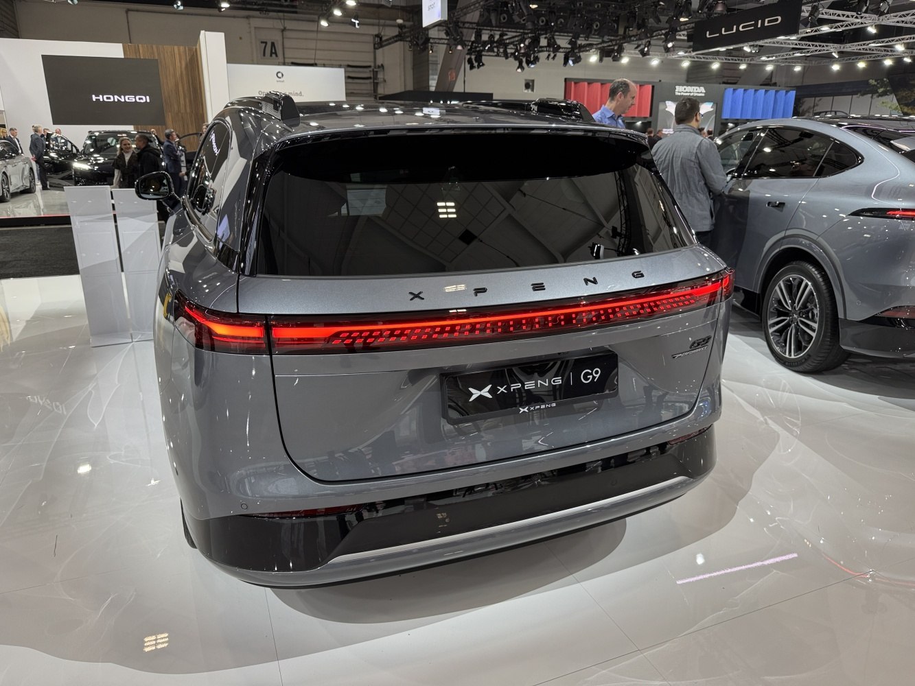 Full width LED tail light and aerodynamic rear design of a modern electric SUV