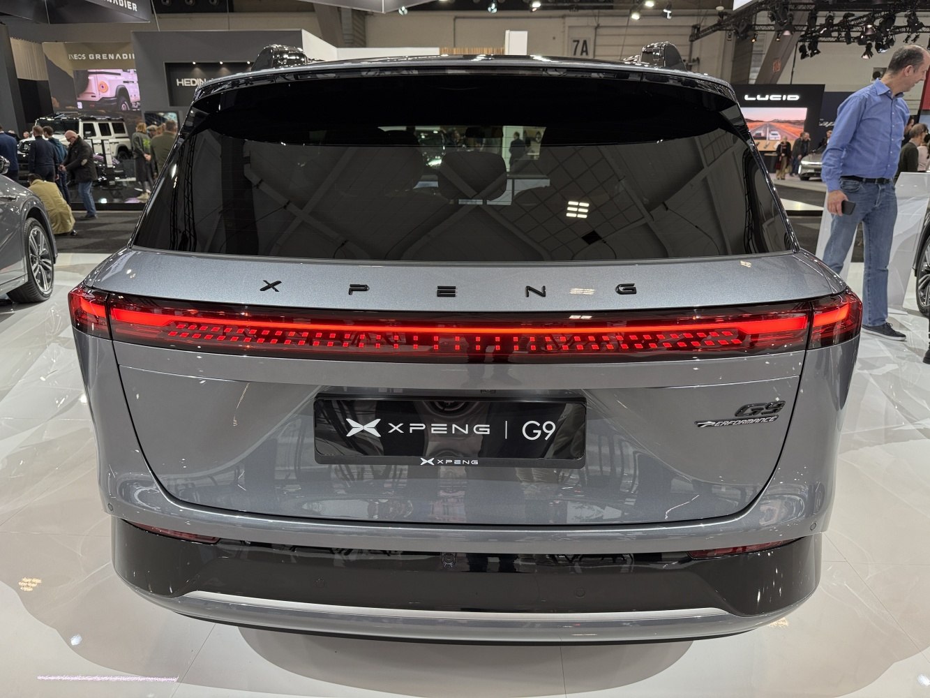 Rear view with full-width LED light bar and smooth aerodynamic design