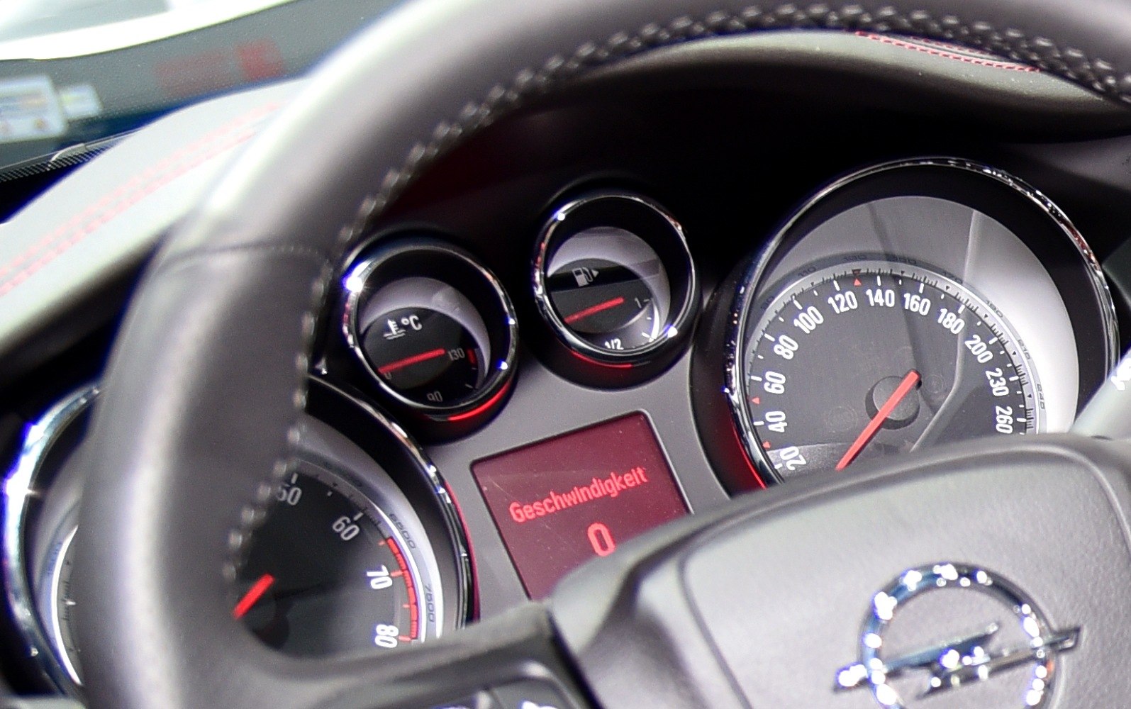Speedometer, fuel and temperature gauges with digital display