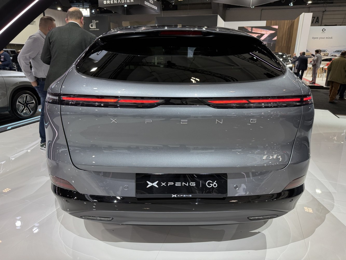 Rear view of a vehicle with sleek LED taillights and smooth, modern design.