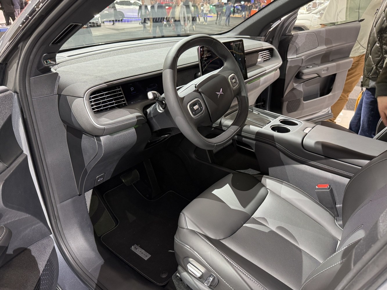 Modern car interior with multifunction steering wheel and digital dashboard