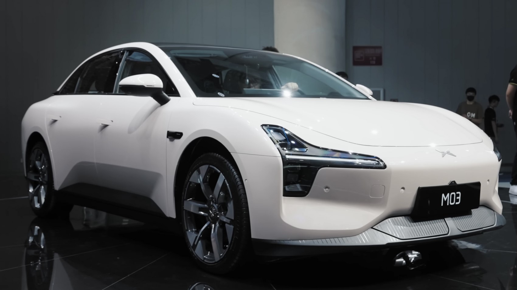 Front angle view with sleek LED headlights and sporty alloy wheels