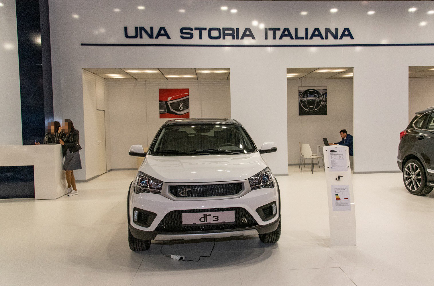 Front view of a compact SUV with distinct headlights and grille.