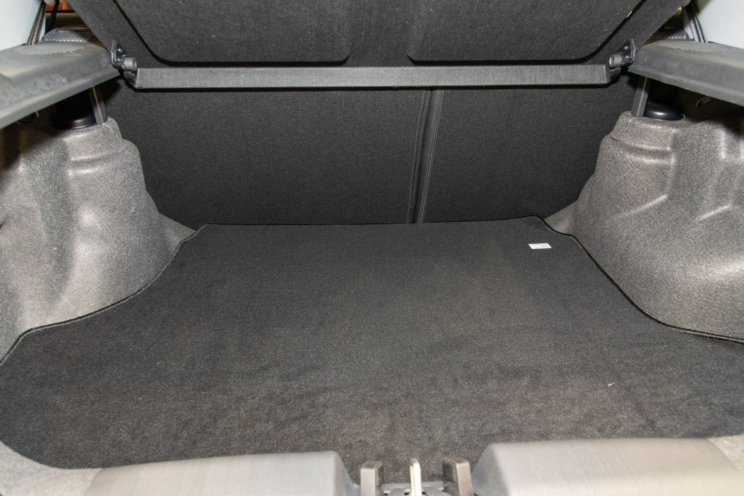 Spacious and clean trunk interior with ample cargo space.