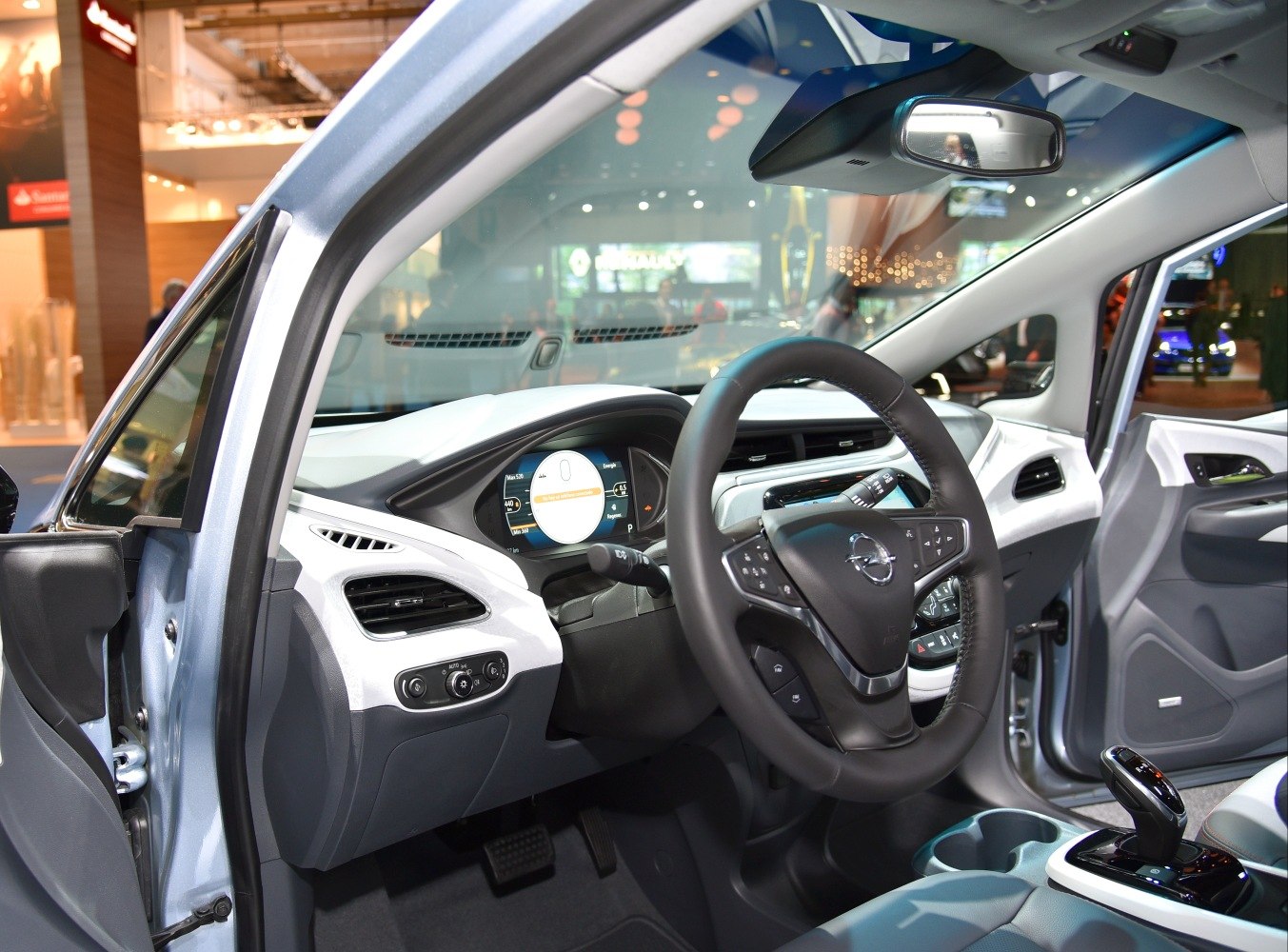 Interior dashboard and steering wheel with digital display and gear lever