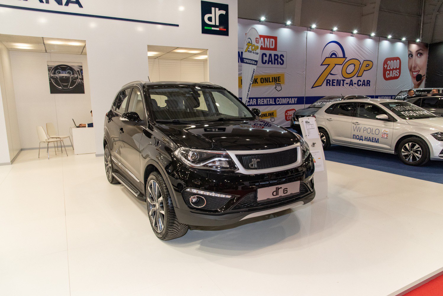 Front view and alloy wheels of black SUV