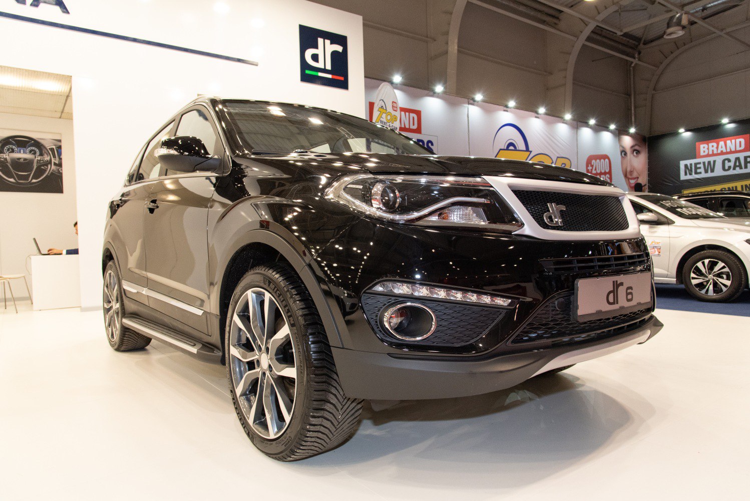 Front view of SUV with distinctive headlights and grille