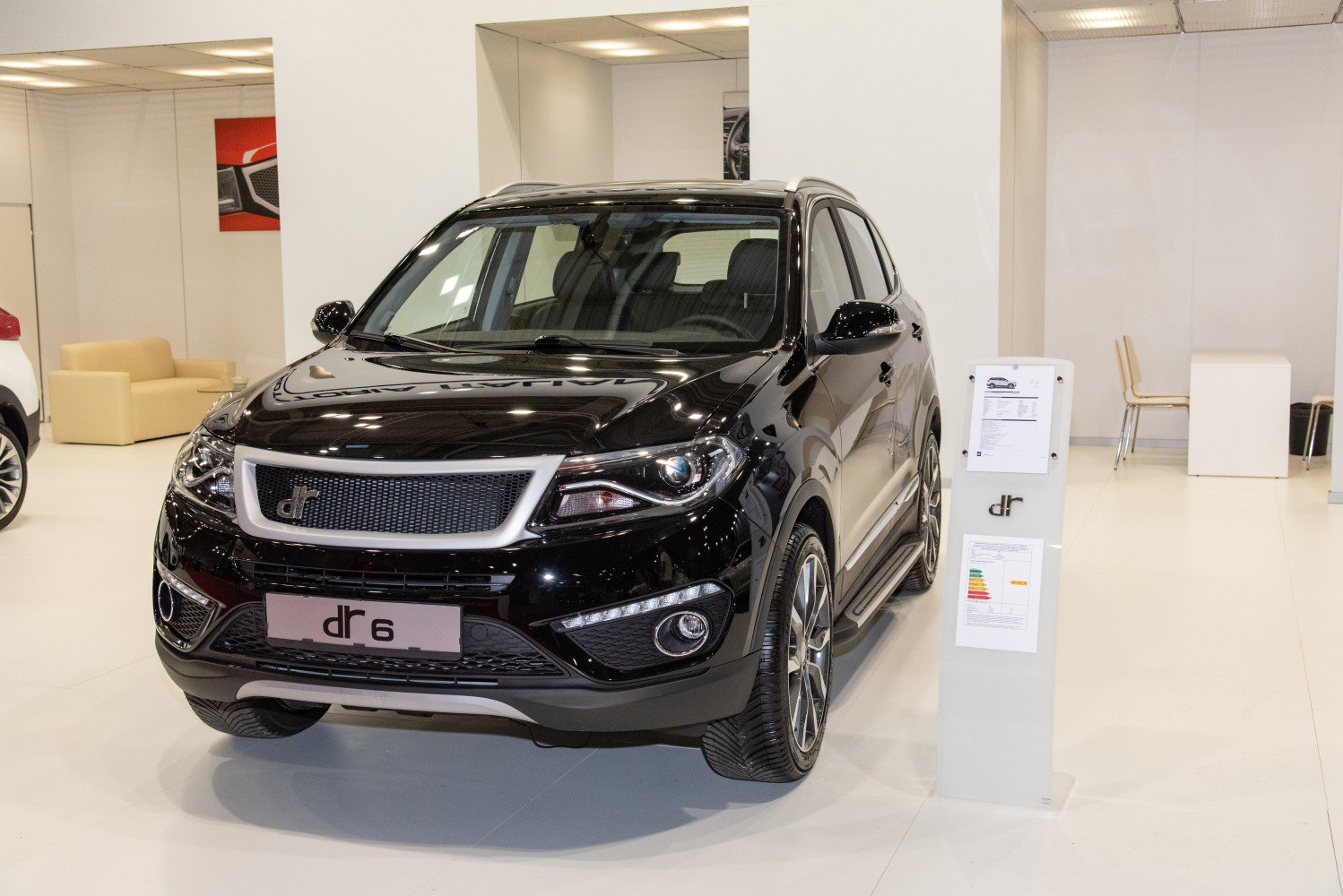 Front view of a black SUV with distinctive grille and headlights