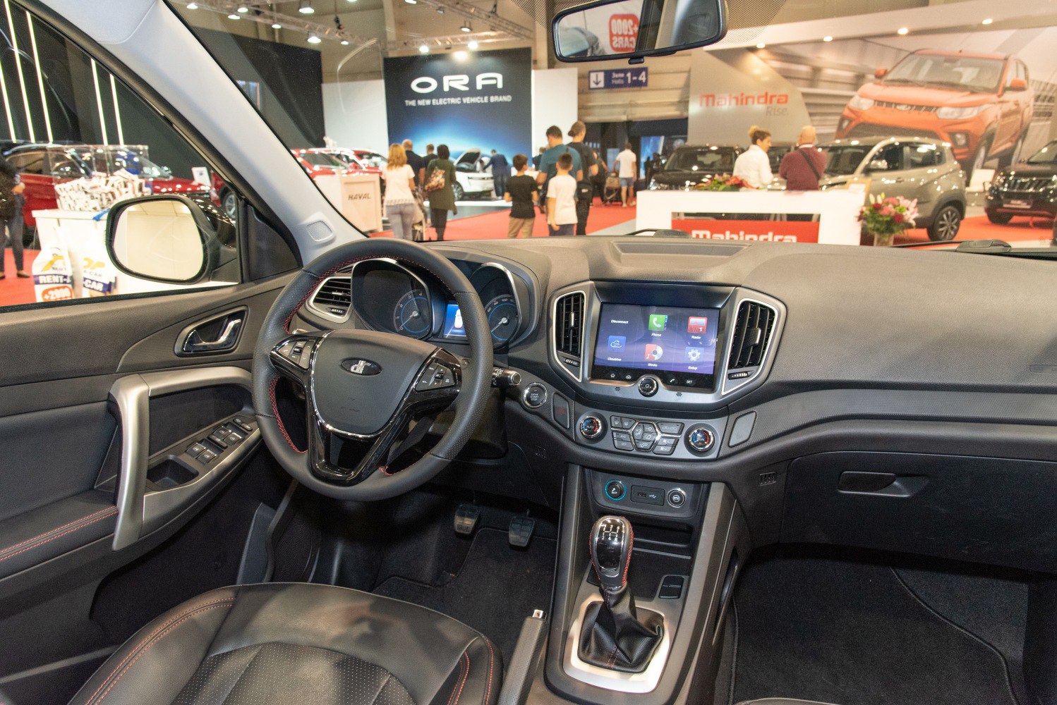 Modern car interior with touchscreen and manual gear shift