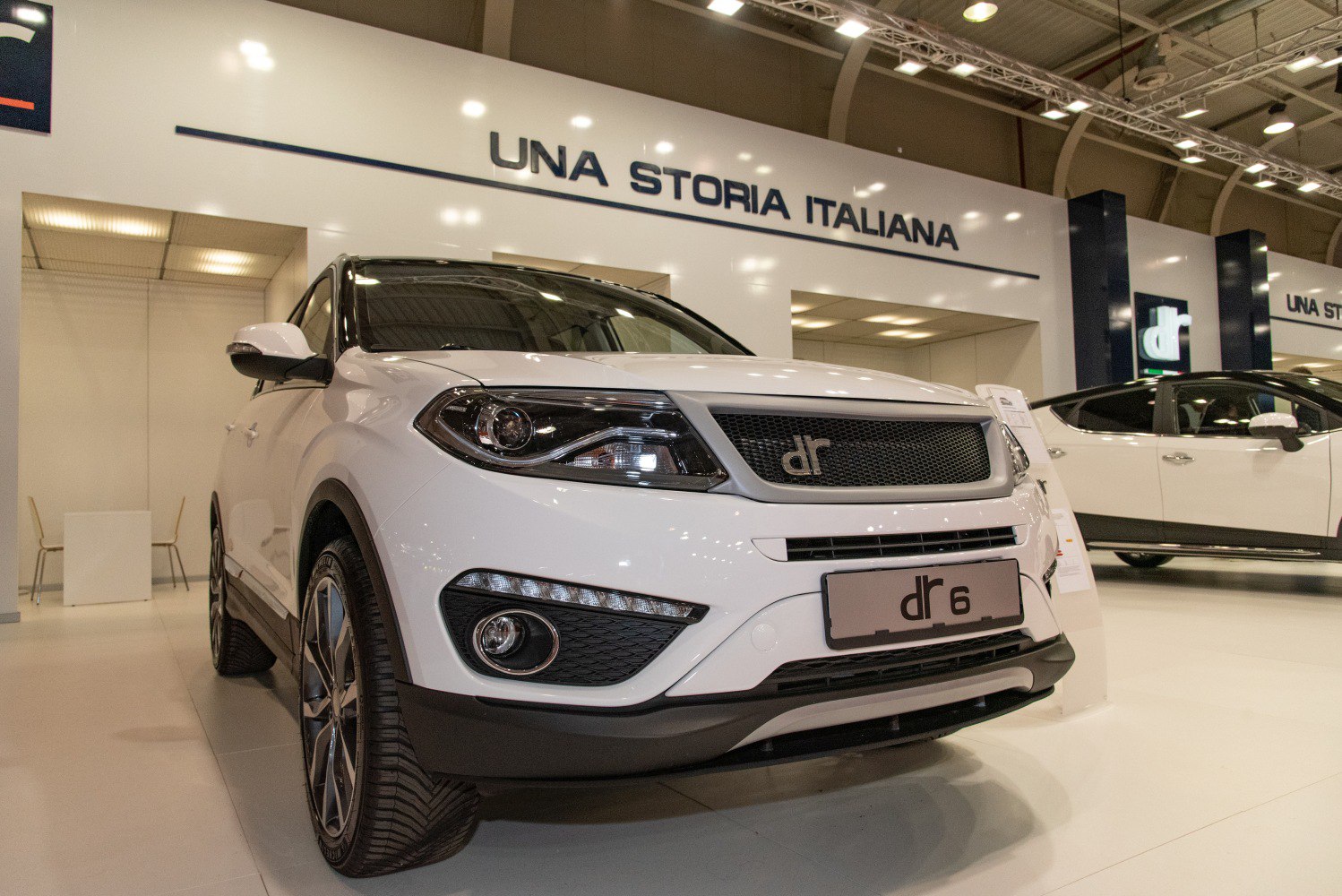 Close-up of SUV front with LED headlights and sporty grille