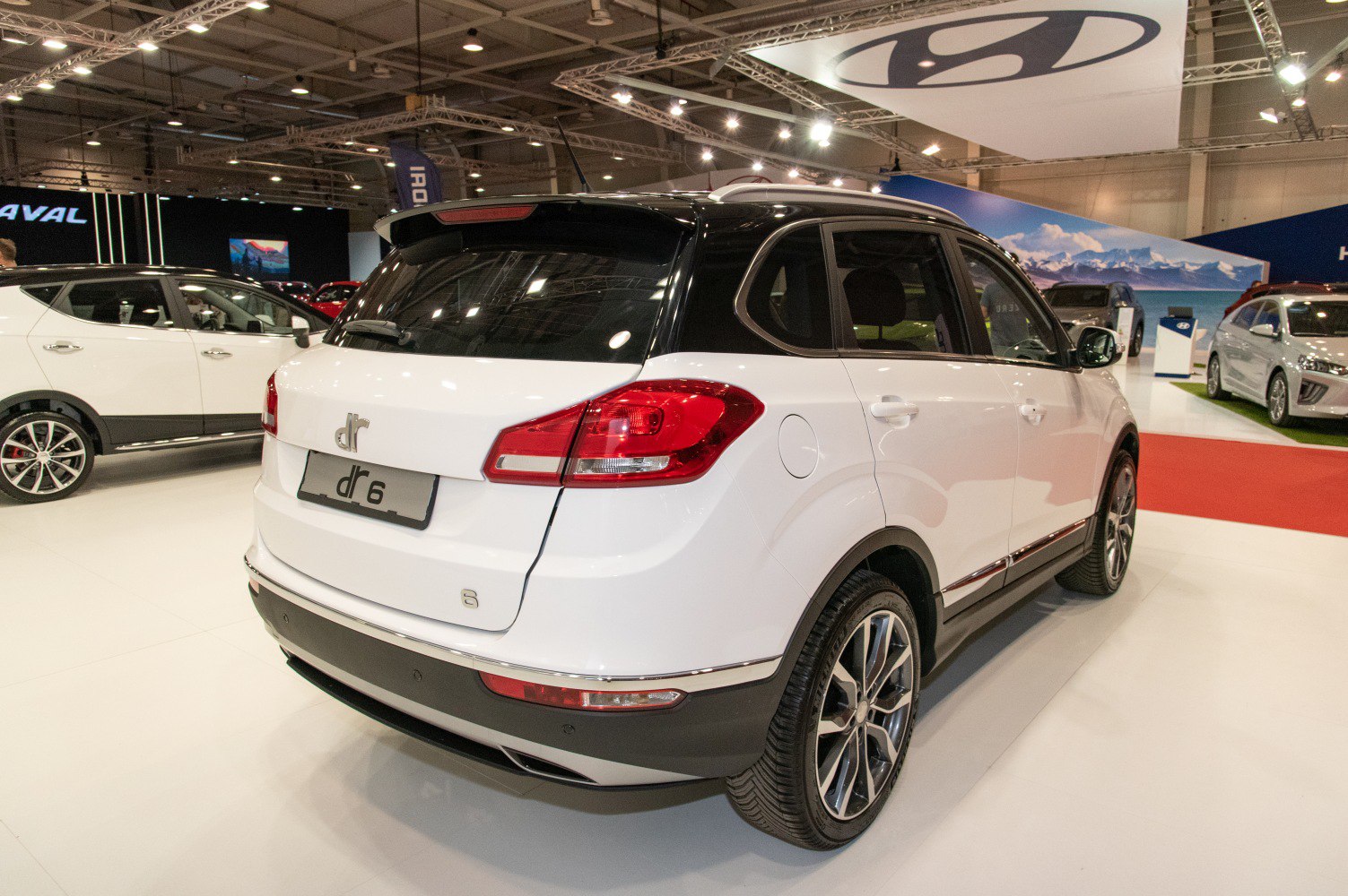 Rear and side view of SUV with sleek taillights and alloy wheels