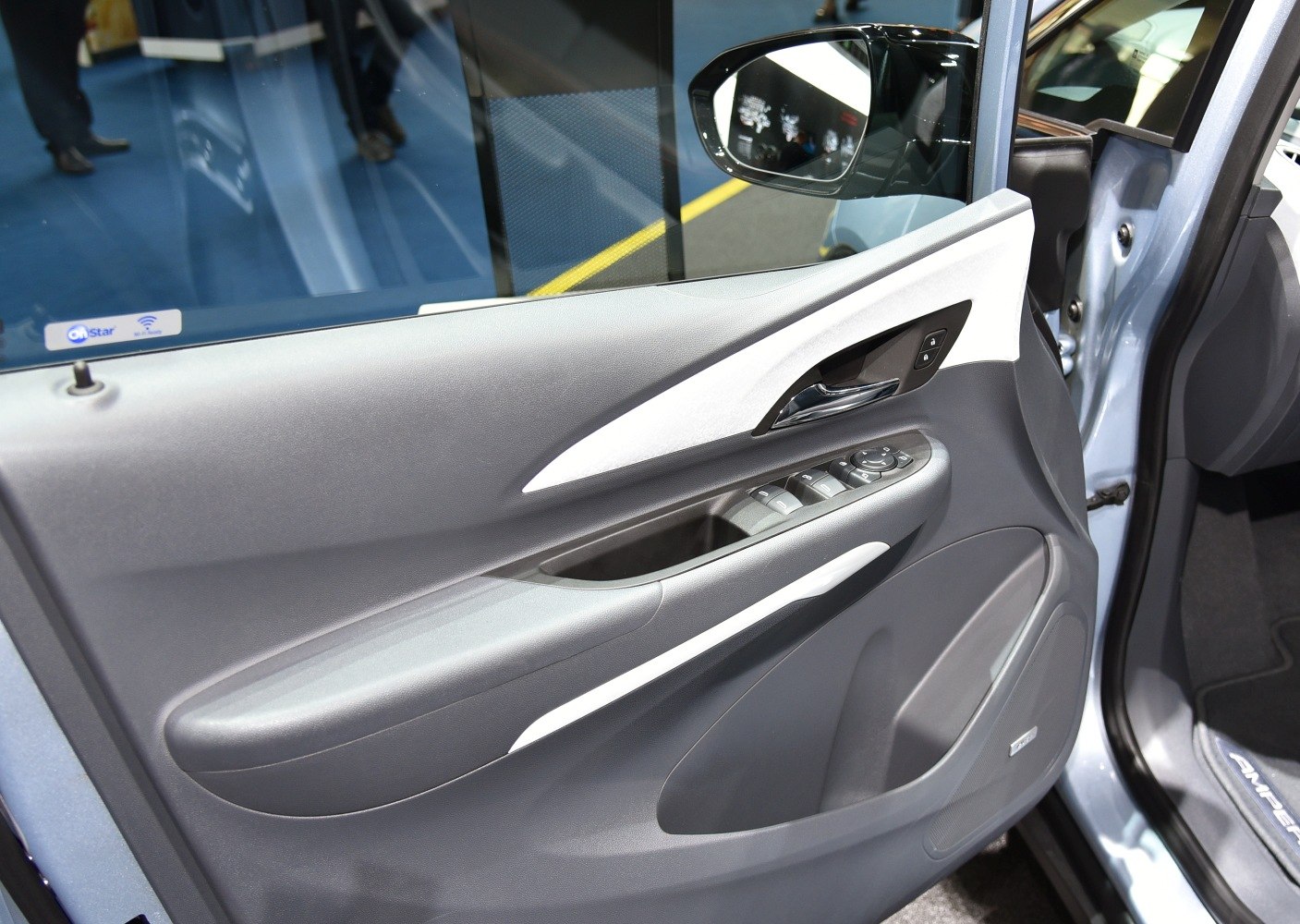 Front door interior panel with window and mirror controls