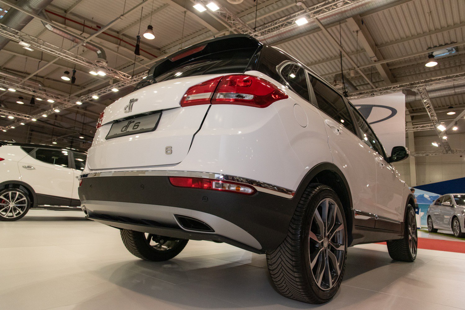 SUV rear with dual exhaust, LED taillights, and alloy wheels