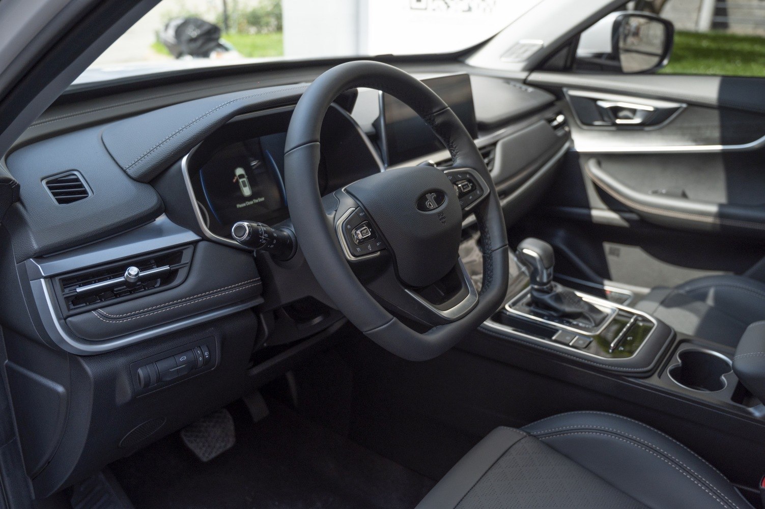 Steering wheel with digital dashboard and center console
