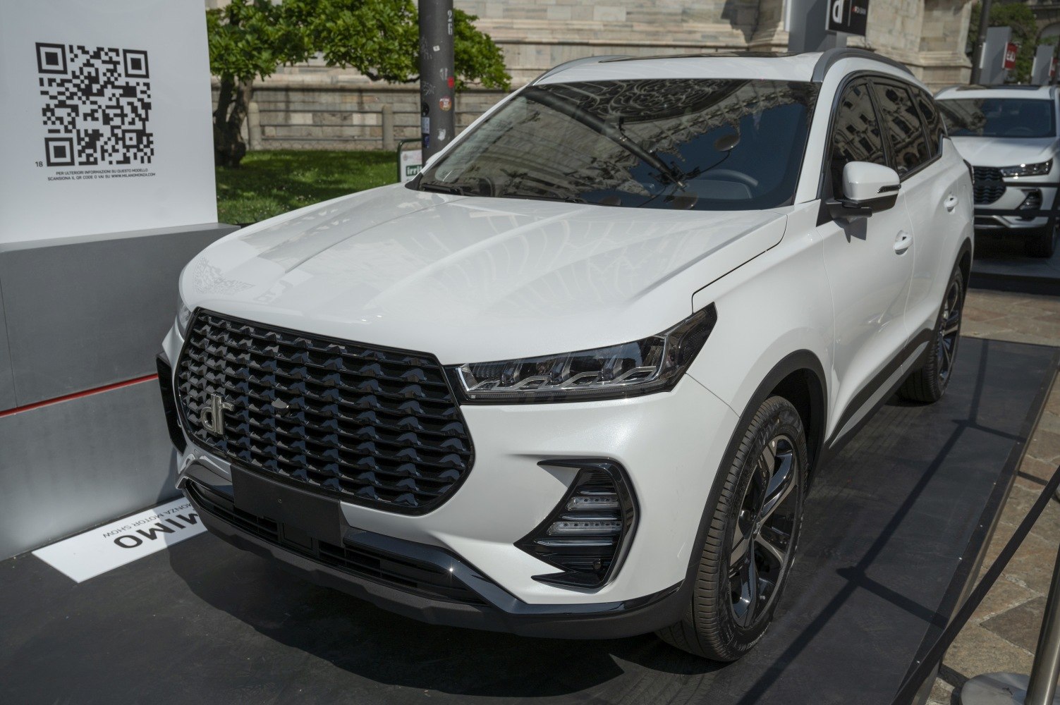 Bold front grille and sleek headlights of a modern SUV