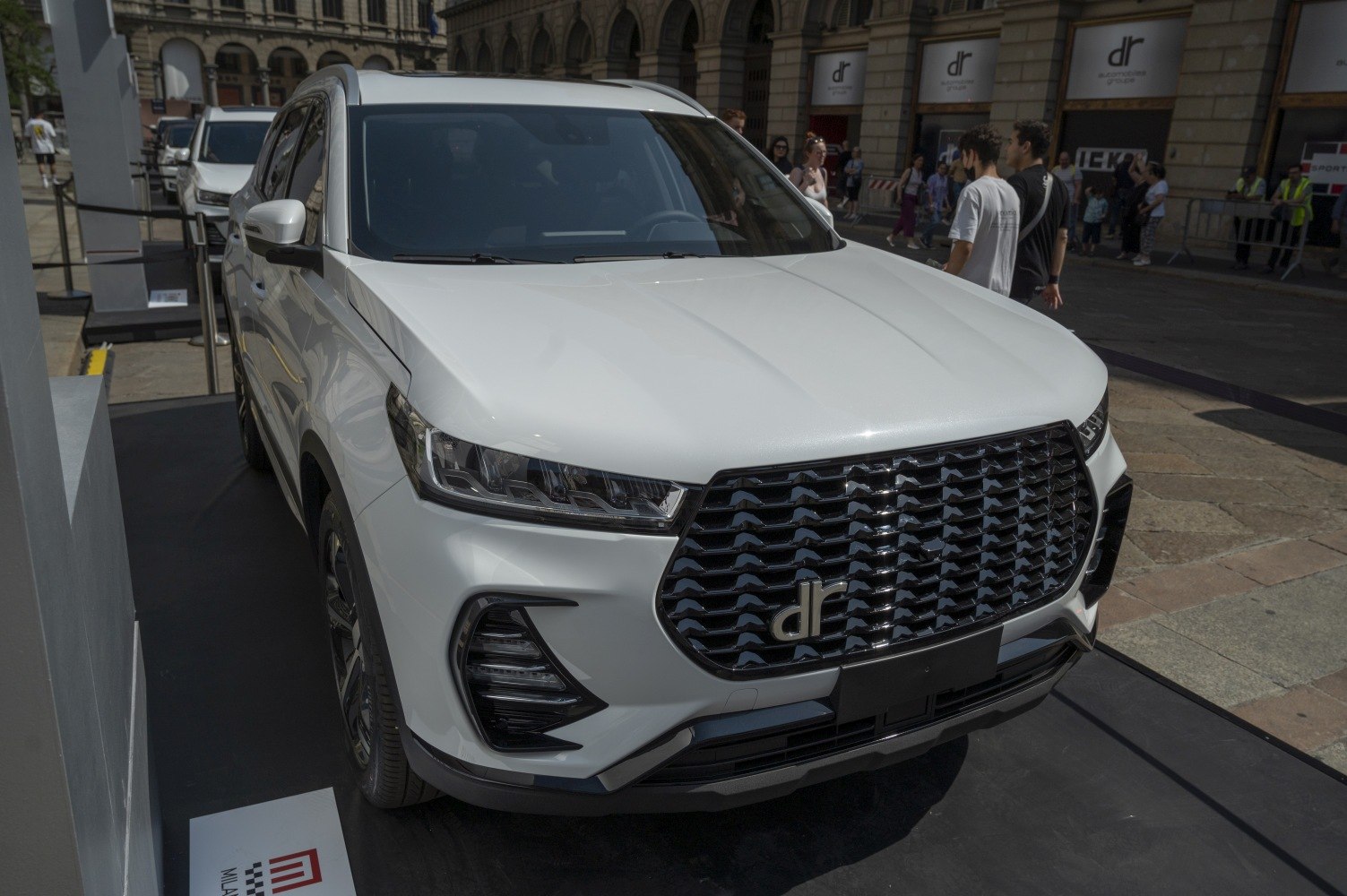 Bold front grille and sleek LED headlights on a modern SUV.