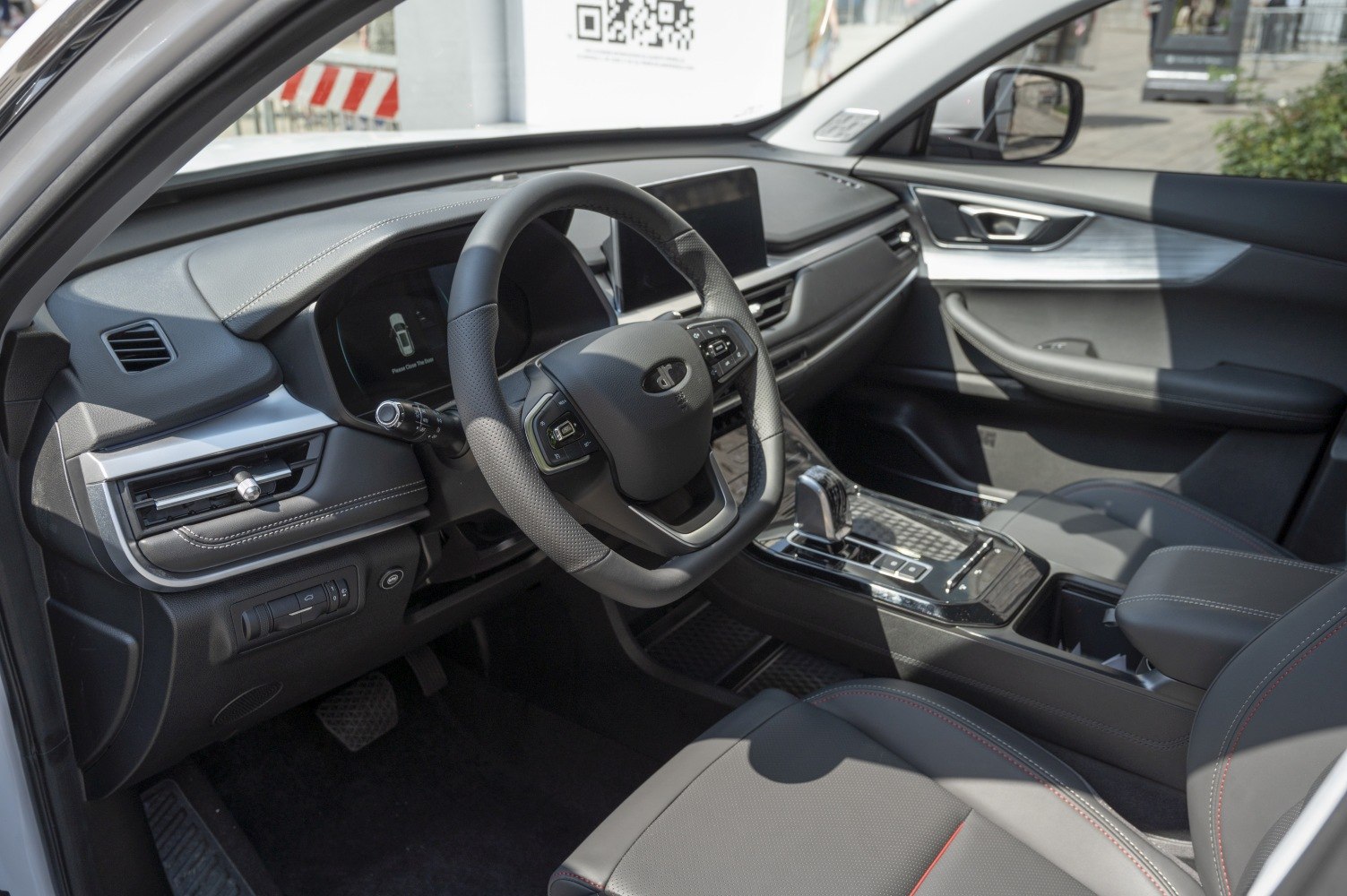 Premium dashboard and ergonomic steering wheel in modern car interior