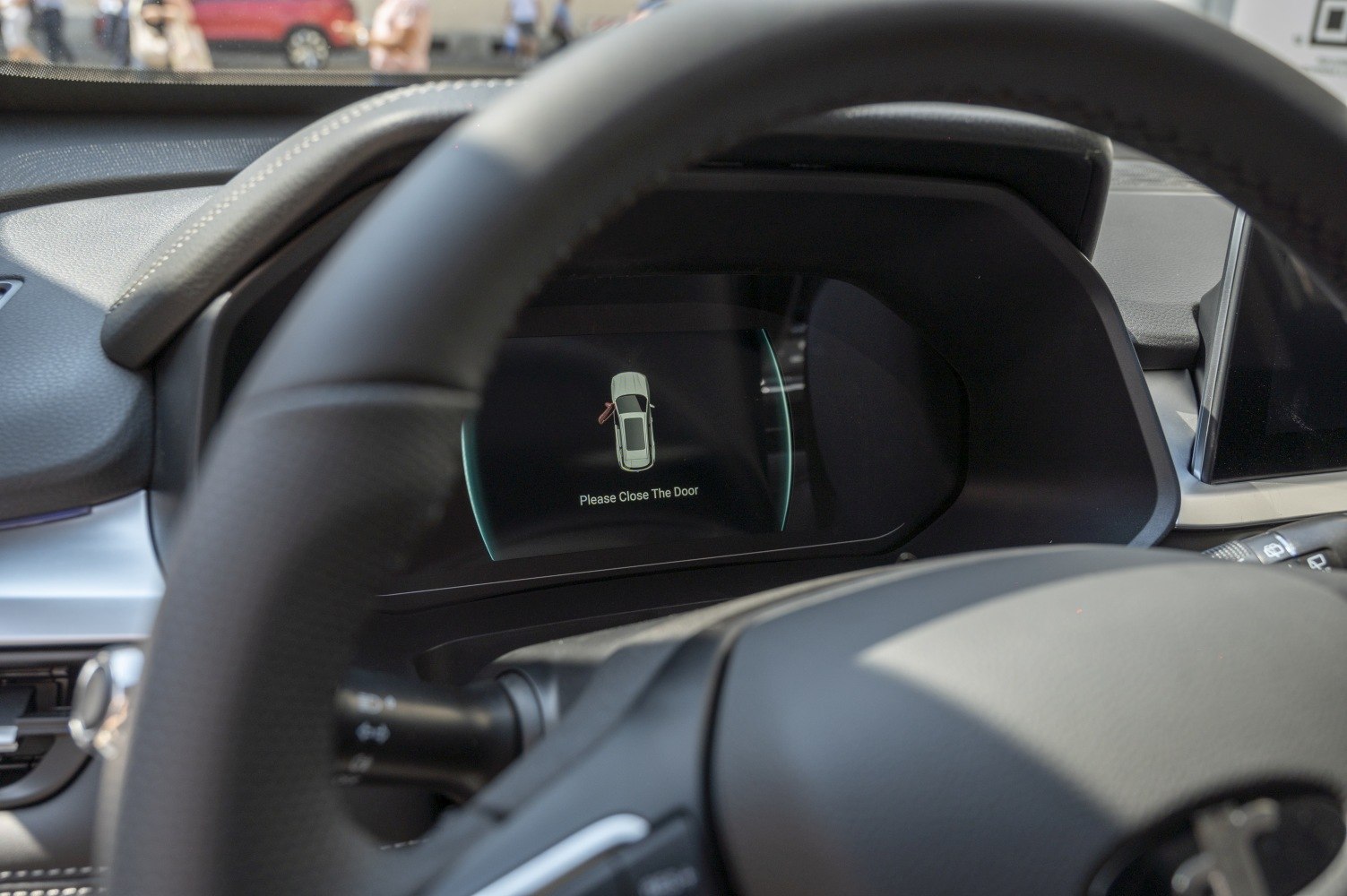 Digital instrument cluster showing door open warning