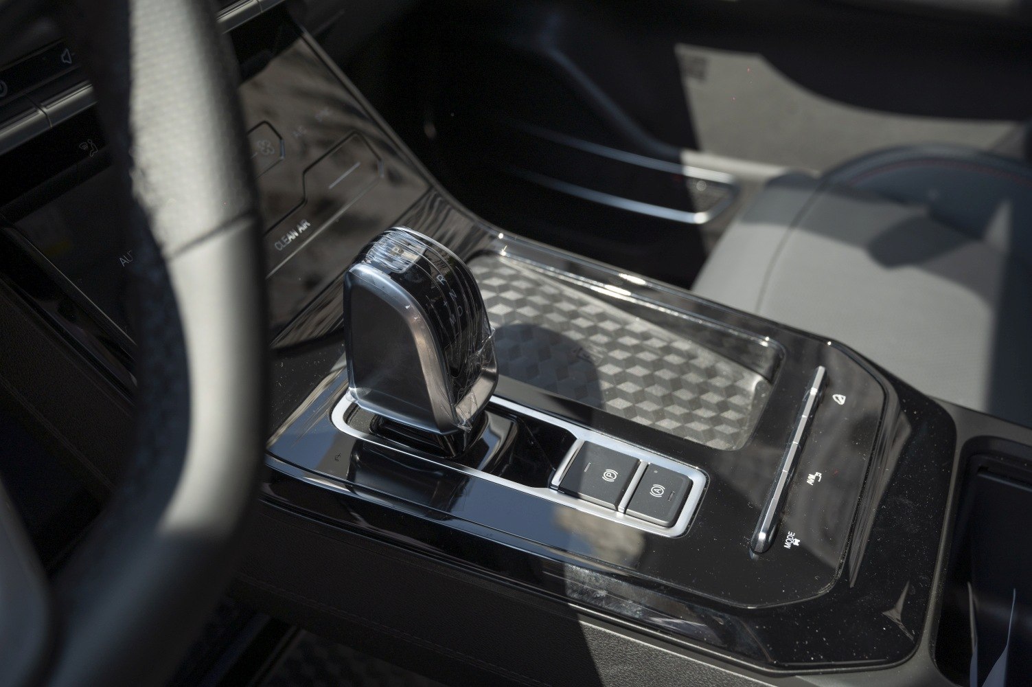 Automatic gear shift lever and center console with electronic parking brake