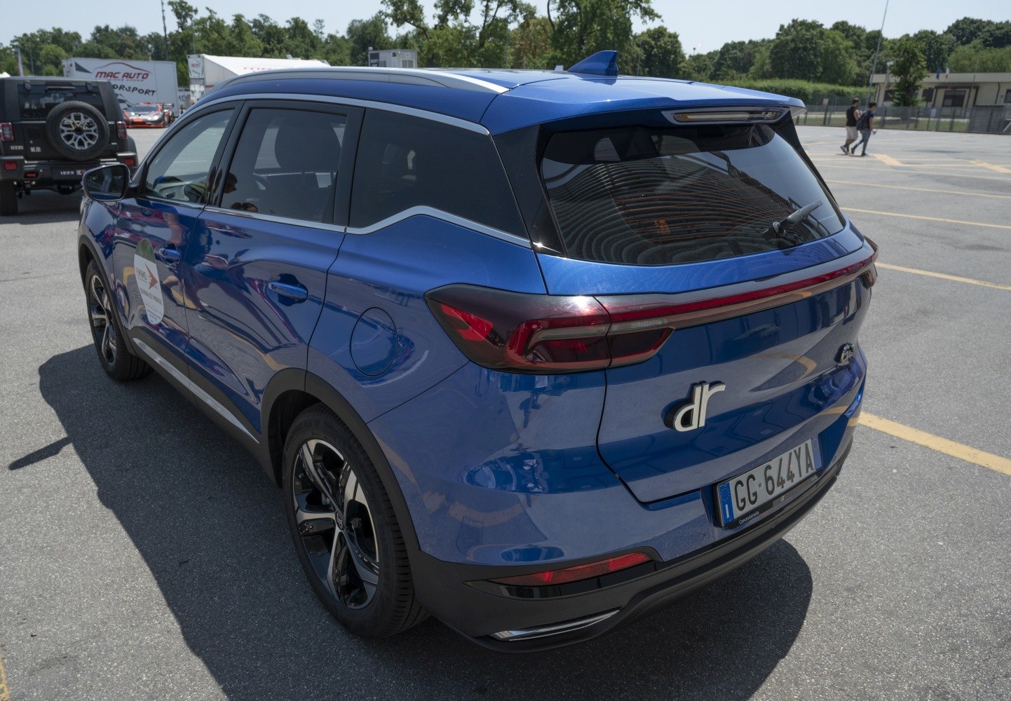 Rear view of an SUV with LED tail lights and shark fin antenna
