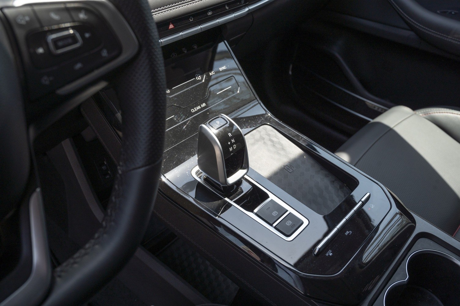 Automatic gear shift lever and stylish center console layout