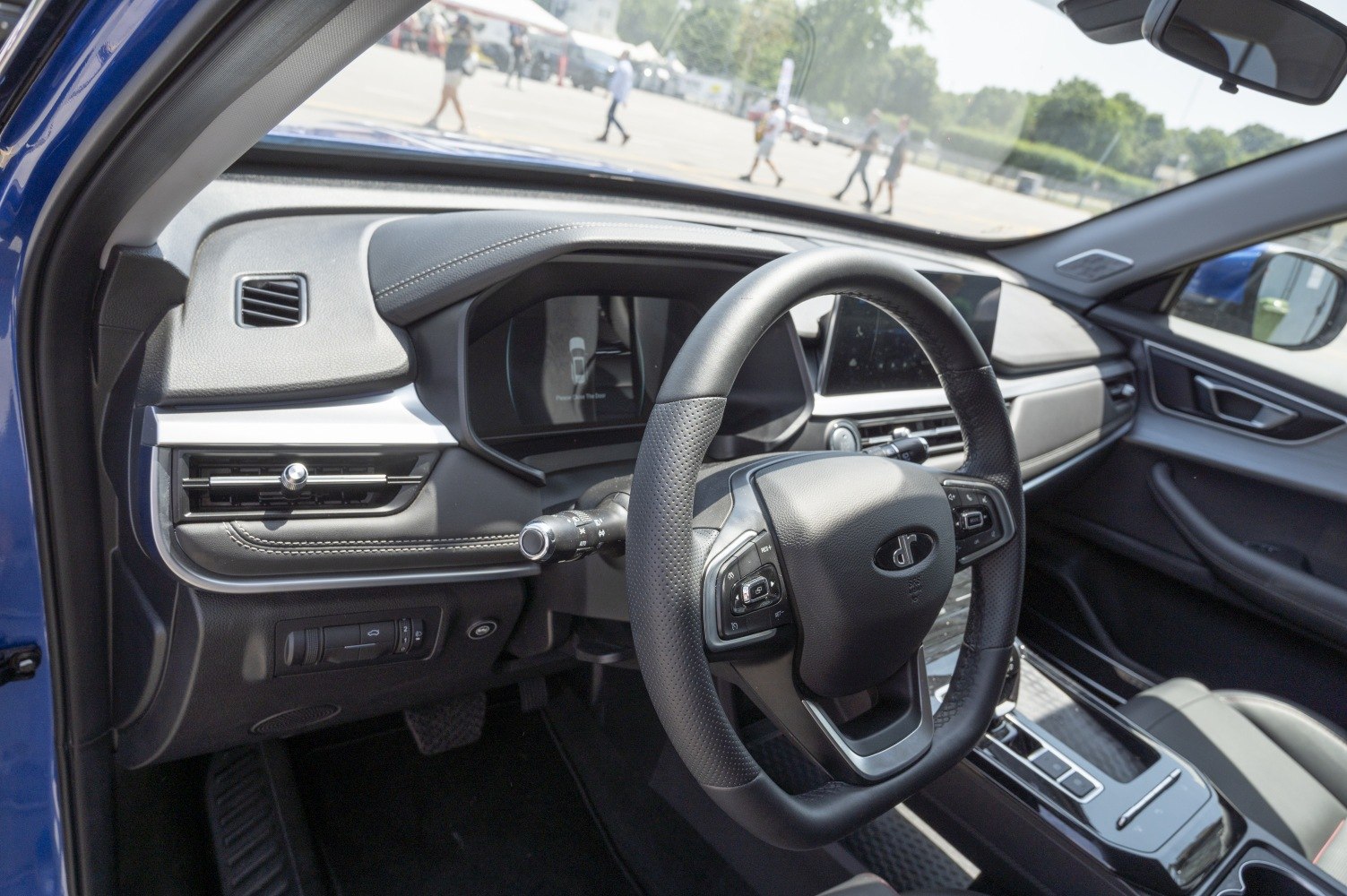 Digital instrument cluster and multifunction steering wheel controls