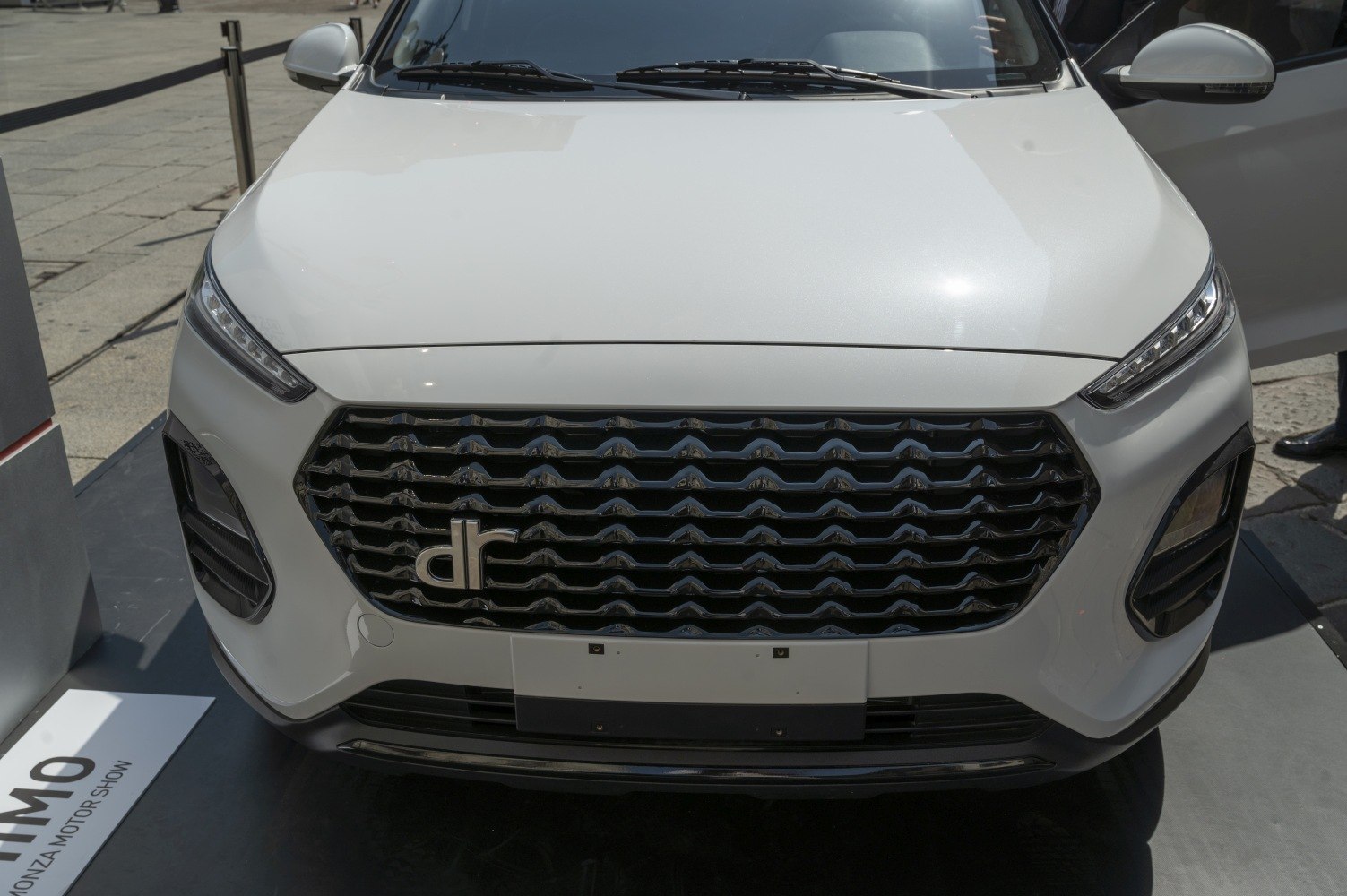 Front grille and LED headlights of a modern SUV